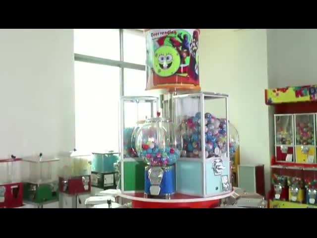 Чеканьте управляемую машину гумбалл примите 1 - 1,4 автомат конфеты капсулы красочный видео