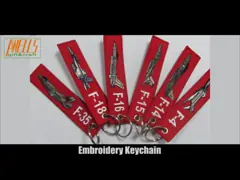 Поток полиэстера талрепа полета вышил ключевой цепной бирке video