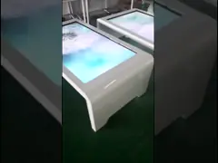 Интерактивный 43-дюймовый LCD сенсорный экран стол с беспроводным зарядным устройством video