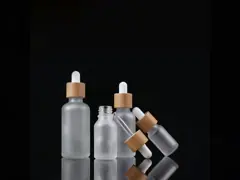 Горячей замороженная продажей янтарная бутылка стекла лосьона косметик масла cbd эфирного масла сливк глаза с бамбуковой крышкой капельницы video