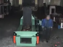Scrap metal baler