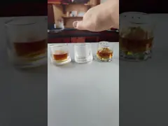 the INS turning tumbler whiskey glass