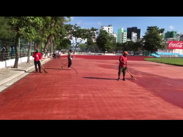 A área do semicírculo pré-fabricou esportes que sintéticos as superfícies seguem vermelho