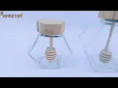 Прозрачные опарникы меда шестиугольника 100ML сжимают опарникы меда наговора соуса video