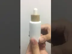 стеклянная капельница 30ml разливает горячее надувательство/стекло по бутылкам с бамбуковым OEM бутылок эфирного масла воротника video