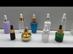 Ориентированные на заказчика 2023 новых бутылки капельницы дизайна 30ml стеклянных с нижним кронштейном для эфирного масла и косметик video