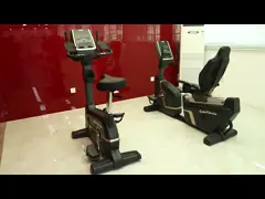 Крытый неподвижный велосипед тренировки, стойка моторизованный магнитный велотренажер video