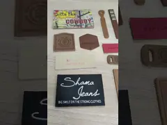 Чувствуемые материальные изготовленные на заказ вышитые заплаты шьют на затыловке с Tassels video