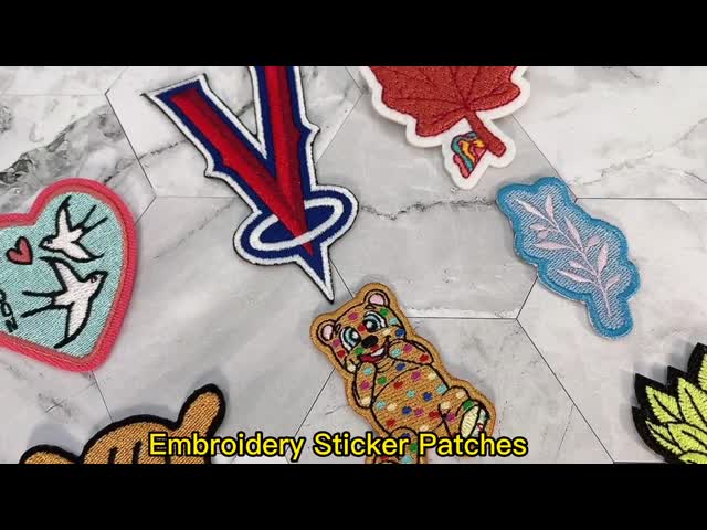 Сплетенная мультфильмом заплата логотипа, шьет на таможне логотипа заплат одежды видео