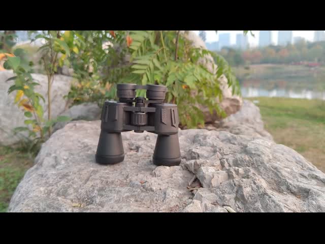 Prismáticos potentes del verde de la gama larga 7x50 10x50 para viajar El video