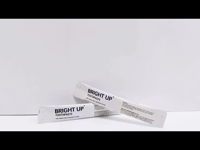 Small mini hotel travelling toothpaste with eco-friendly recyclable paper sachet packing