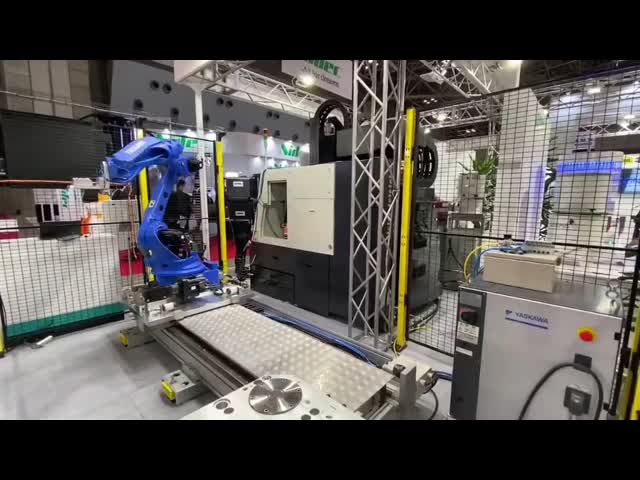 研修会12kgを処理するYaskawa MOTOMAN-AR1440レーザーに荷を積むYaskawaの腕のロボット