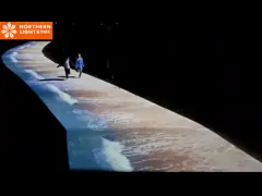 Интерактивная проекция на полу северного сияния video