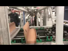 Машина для упаковки напольного материала с клейкой на горячем расплаве для упаковки напольного материала из ПВХ video