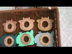 Многофункциональный силиконовый детский зубник с присоединяемым деревянным кольцом для зубов video