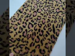 Matériel 320gsm 150D 288F de fourrure de lapin imprimé par léopard