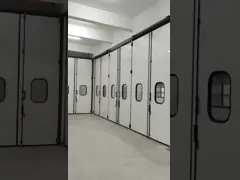 Portes pliantes grises sur mesure sans moteur avec charnières en fonte