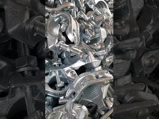 Горяче погруженный оцинкованный Q235 Golden JIS Double Coupler для скелетов