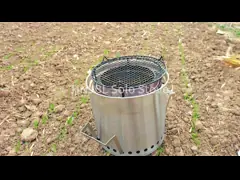 На открытом воздухе плита нержавеющей стали вокруг деревянной белизны горящей ямы огня серебристой video