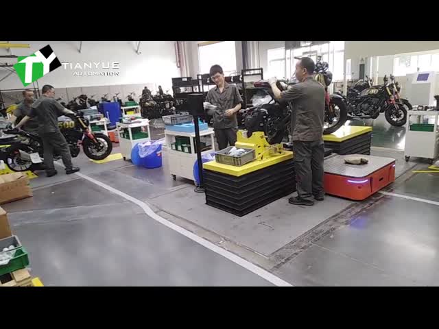 Véhicule à guidage automatique à ascenseur simple électrique AGV omnidirectionnel 1500 kg Capacité de charge Volant vidéo