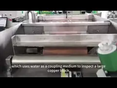Video of ultrasonic equipment using water as coupler to detect large copper blocks