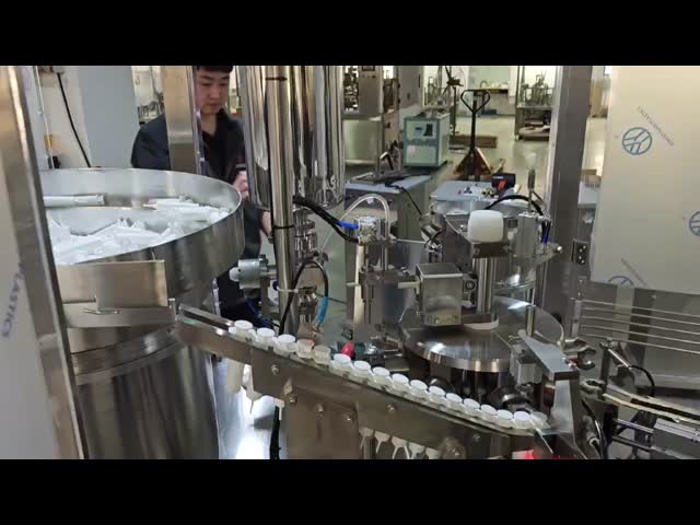 自動プラスチックベンチトップ注射器の詰め機