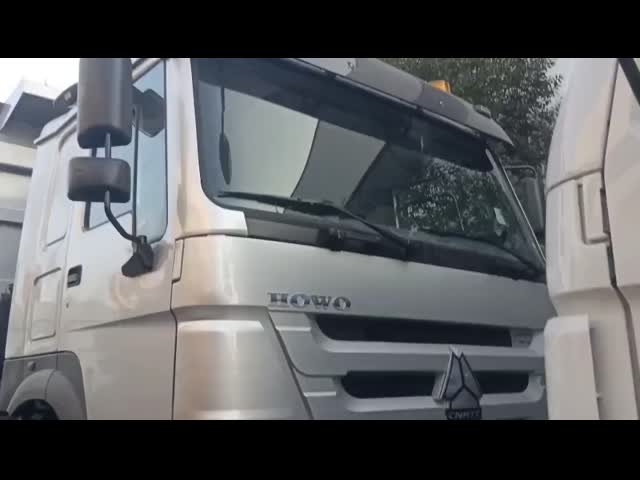 Sinotruk Howo トンパーダンプトラック Tx 400hp ユーロ 2 8 × 4 Lhd U形貨物箱 赤