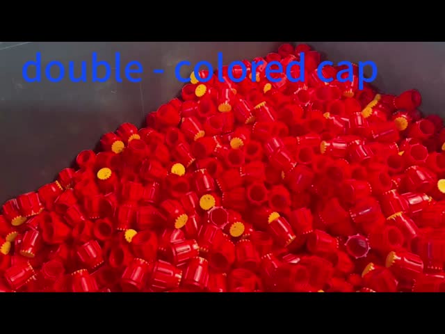 Dual-color injection molded caps