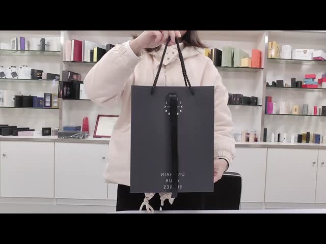 Roupas de luxo Bolsas de compras de papel Bolsas de presente brancas com alças de fita