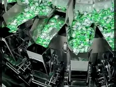 Machine de remplissage et d'étanchéité de collations personnalisée avec convoyeur à vis pour le pesage multi-têtes au détail video