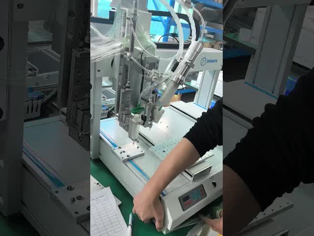 2つの配給バルブを持つ汎用的な産業用自動配給機 電圧 110V/220V 電力消費量 500W