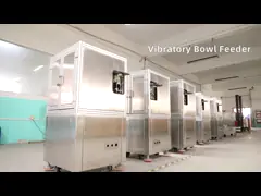 Alimentação por vibração electromagnética de um recipiente de alimentação com botão de interruptor de via dupla