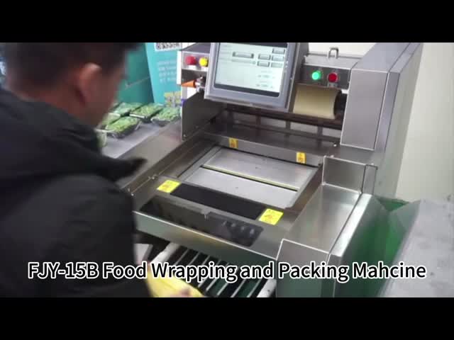 スーパーマーケットの包装機器 商業用果物・野菜 食品を包装するためのフィルム包装機 体重とラベルの機能