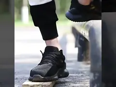 China Swivel Button Black Safety Shoes With Kevlar Midsole And Rubber Sole supplier