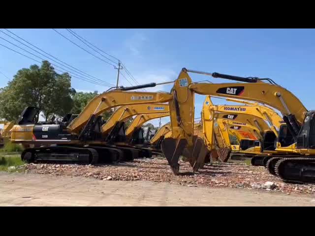 Excavatrice à rouleaux utilisée Cat 349D marque Caterpillar vidéo