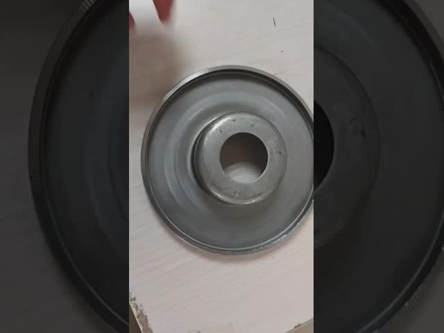 Roller accessory bearing housing turnup end cap with one-piece molding process