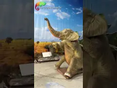 Realistic Animatronic African Elephant Statue Spraying Water In Safari Setting