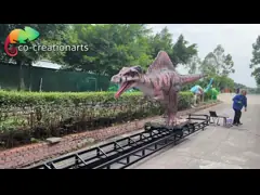 एनिमेट्रॉनिक स्पिनोसॉरस 15 मीटर के ट्रैक के साथ डायनासोर का अनुकरण किया गया थीम पार्क आकर्षण के लिए
