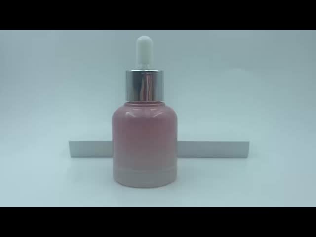 2025年 再利用可能なピンクガラス瓶 オイル用ドロッパーボトル シルバーカラー 高級卸売 30ml