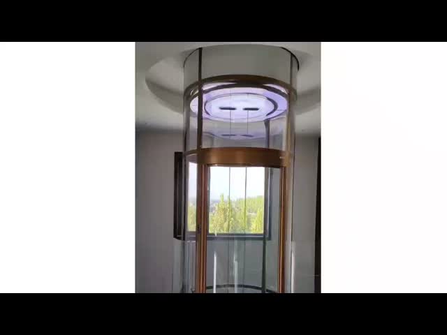 Elegant Circular Glass Elevator | High-Rise Residential Lift