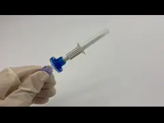 Needleless IV Bag Spike with Filter and Lipid/Alcohol Resistant Valve Port