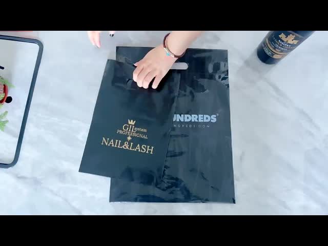 Medium-thick black clothing gift bag with four-finger flat pocket, moisture-proof, carrying plastic handbag, shoes and socks.