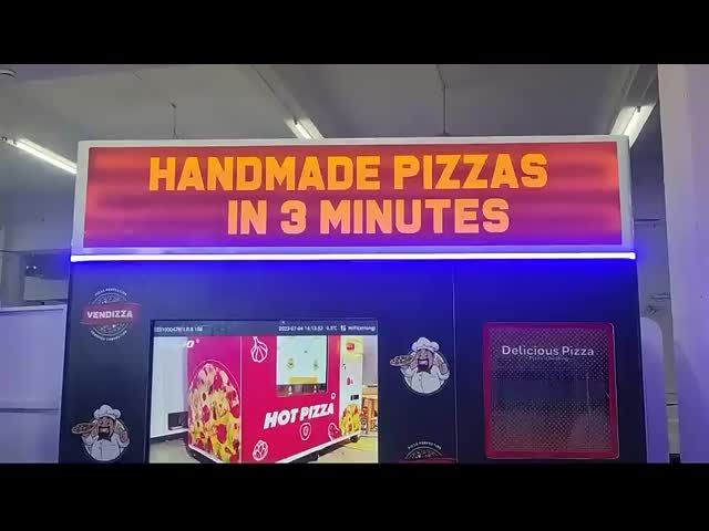 55-inch touchscreen pizza vending machine with heating and baking system, featuring an LED lightbox on the top of the pizza machine