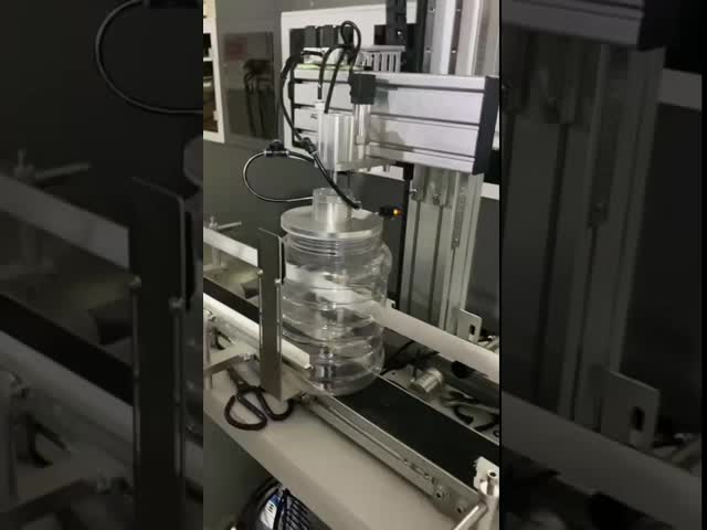 16-03C-N Multi-Head Static Leak Tester Machine with 12,000 bottles/hour capacity, 304 stainless steel construction, and automatic operation