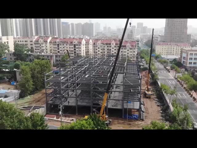 Low Cost Custom Pre Fabricated Industrial Workshop Steel Metal Frame Prefab Hangar Building Modular Warehouse