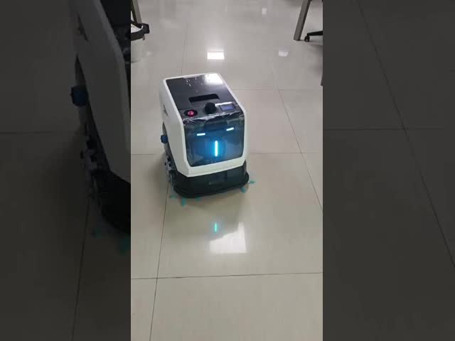 Professional robot vacuum and scrubber for industrial settings, featuring robust construction and powerful suction
