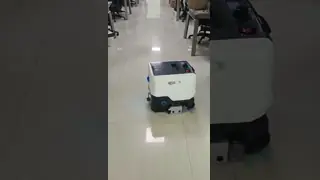 Professional robot vacuum and scrubber for industrial settings, featuring robust construction and powerful suction