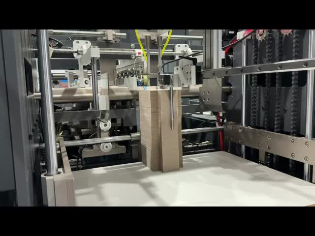 AUTOMATIC RIGID BOX MAKING MACHINE