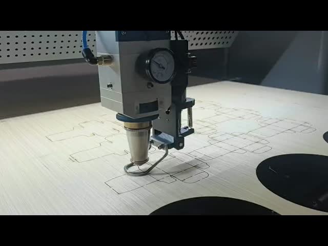 HIGH  PRECISION  DIE-BOARD  LASER  CUTTING  MACHINE